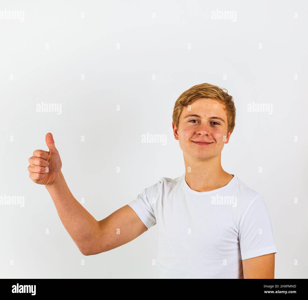 Portrait Of Smiling Cute Boy In Studio Stock Photo Alamy