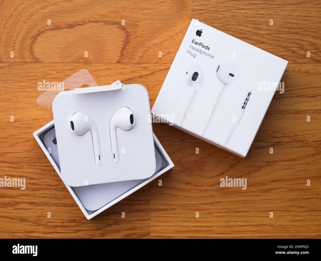 Tambov, Russian Federation - December 14, 2021 New Apple Earpods with their  box on a wooden background Stock Photo - Alamy