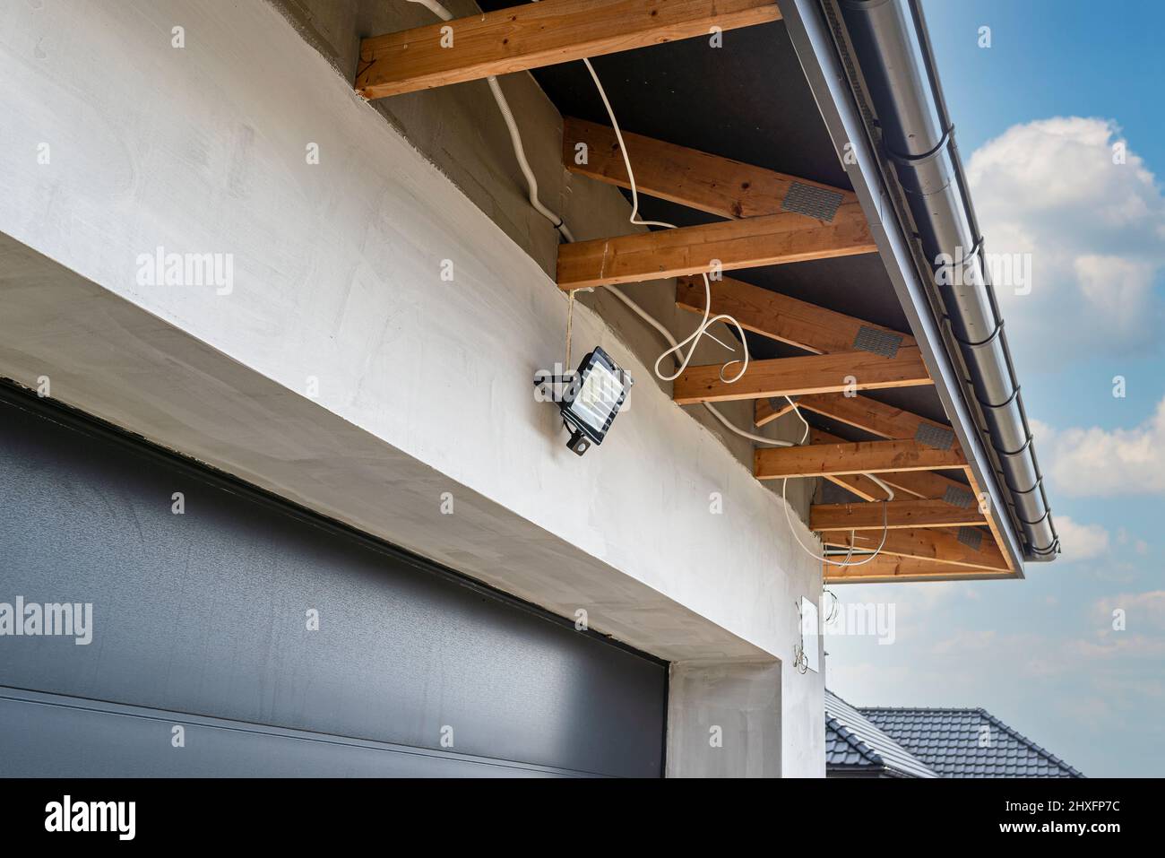 The light for the motion sensor mounted on the facade of the building