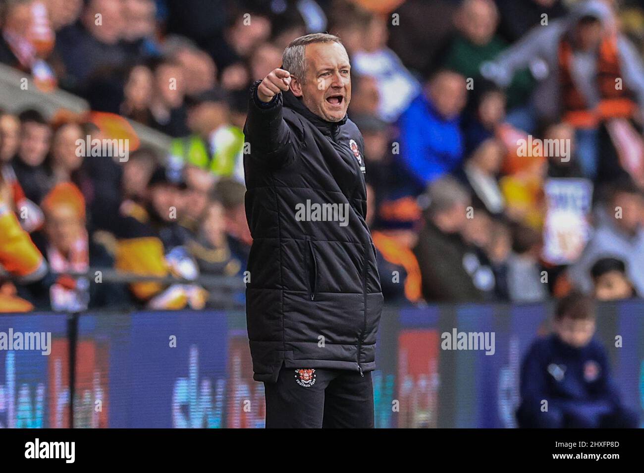 Neil Critchley head coach of Blackpool gives his team instructions