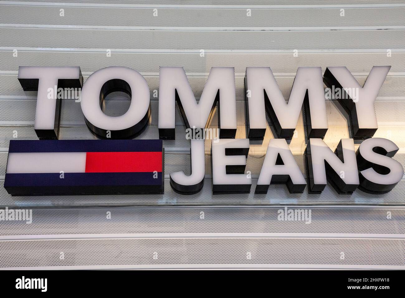 View of the Tommy Jeans brand logo at a store Stock Photo - Alamy