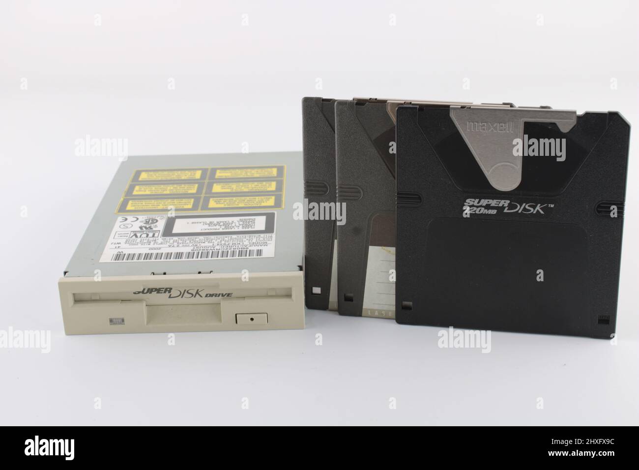 Floppy disk reader and super disk LS120 disks. Stock Photo