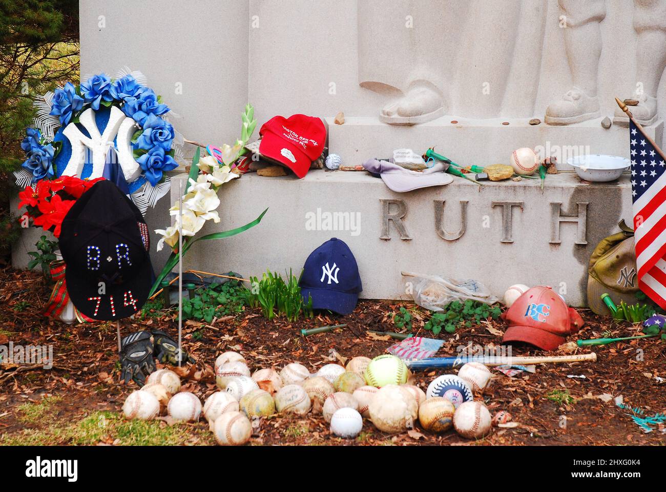 Baseballs and other offers are left at the grave Yankee slugger Babe Ruth Stock Photo