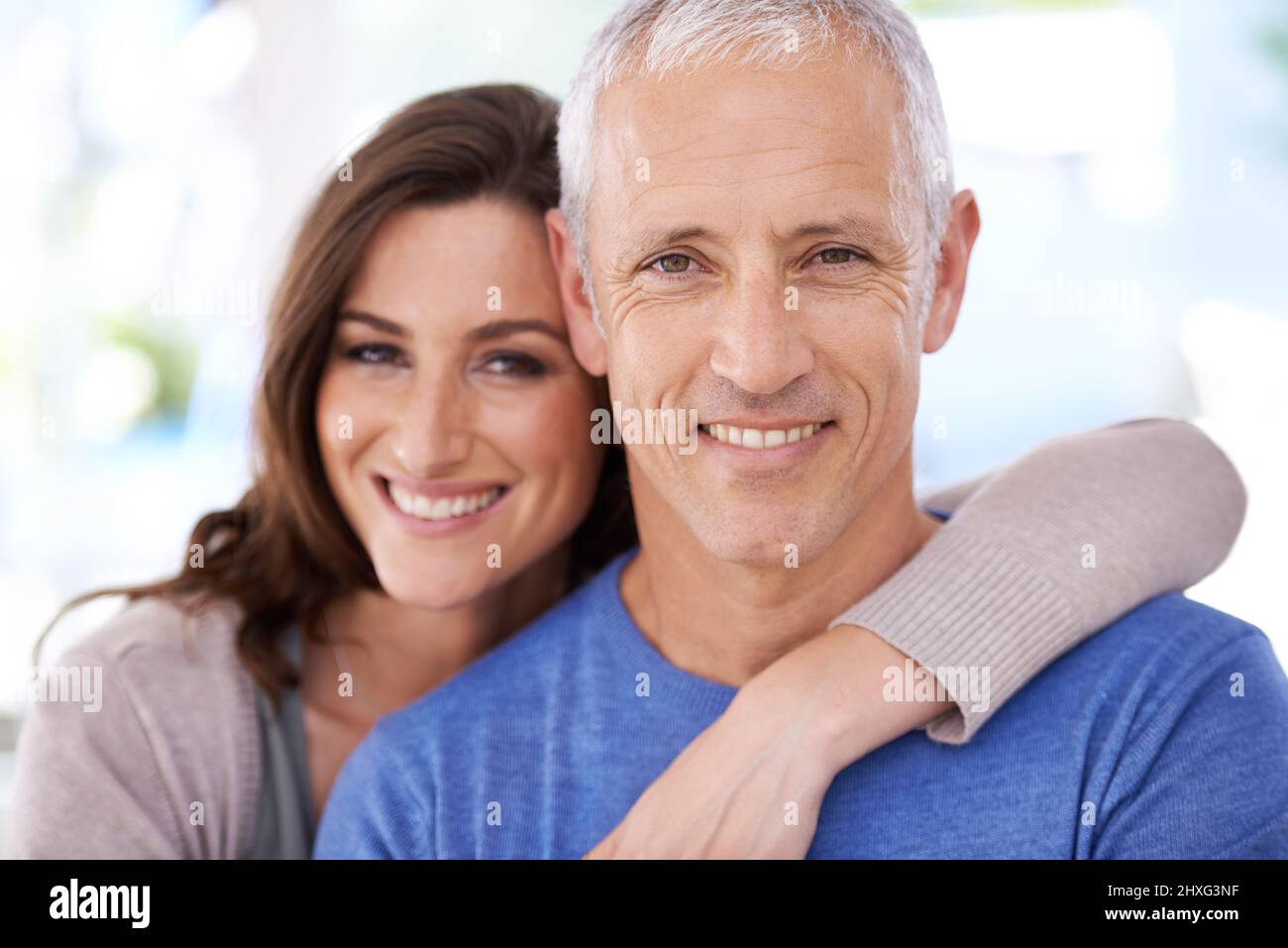 the-face-of-love-shot-of-a-mature-man-and-his-younger-wife-stock-photo