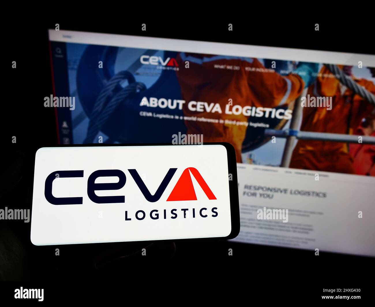Person holding smartphone with logo of French freight company CEVA  Logistics on screen in front of website. Focus on phone display Stock Photo  - Alamy