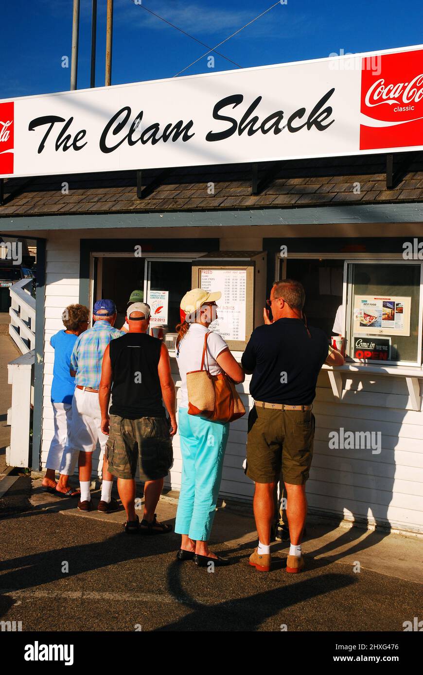 A couple orders their meal at a clam shack in Kennebunkport, Maine Stock Photo