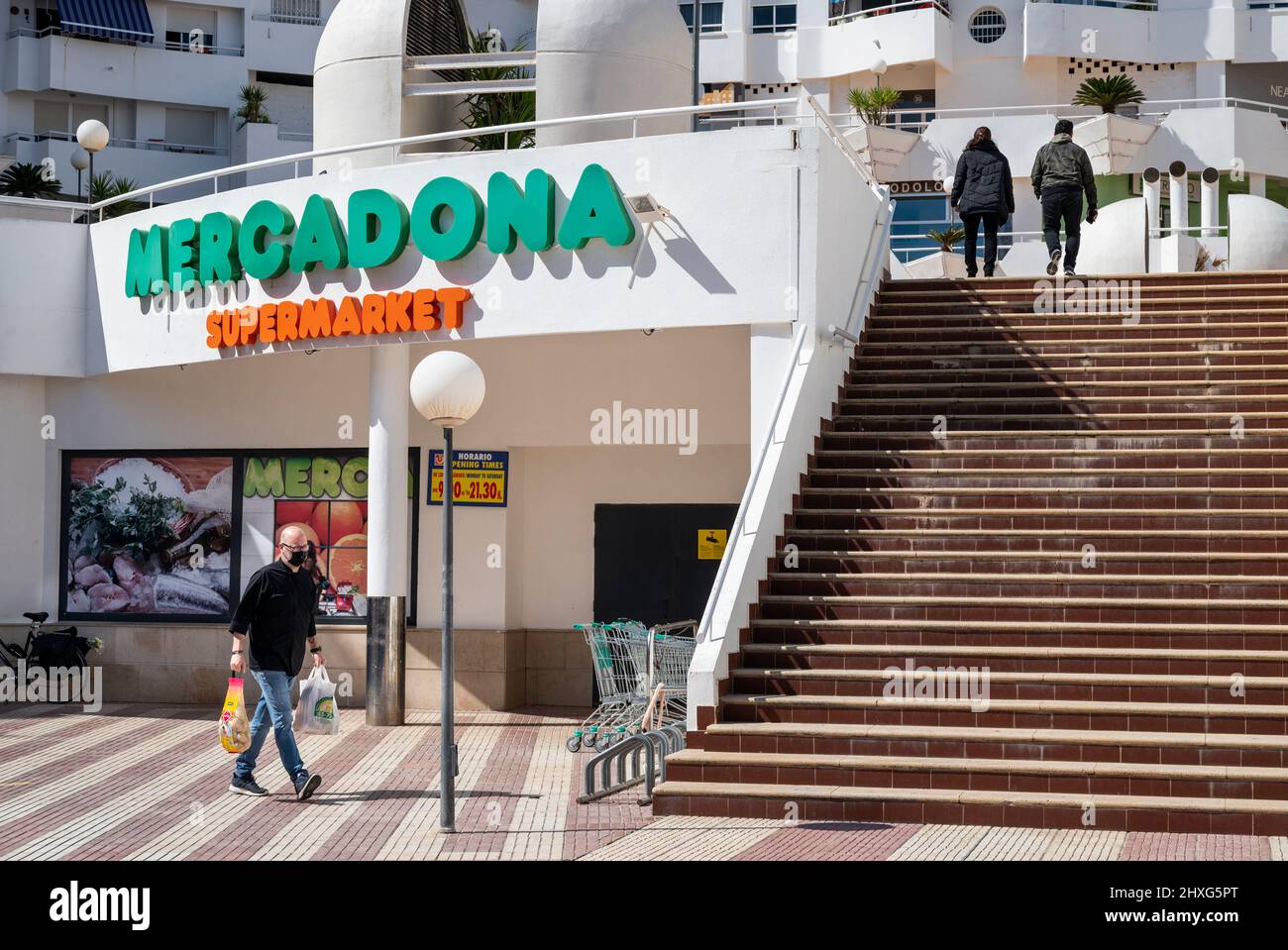 Alicante, Spain. 11th Mar, 2022. A shopper is seen holding groceries as