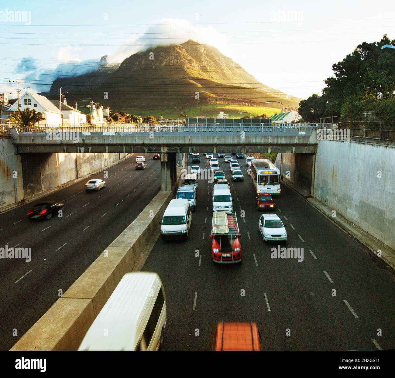 Home time in the city. Shot of a traffic on the motorway. Stock Photo