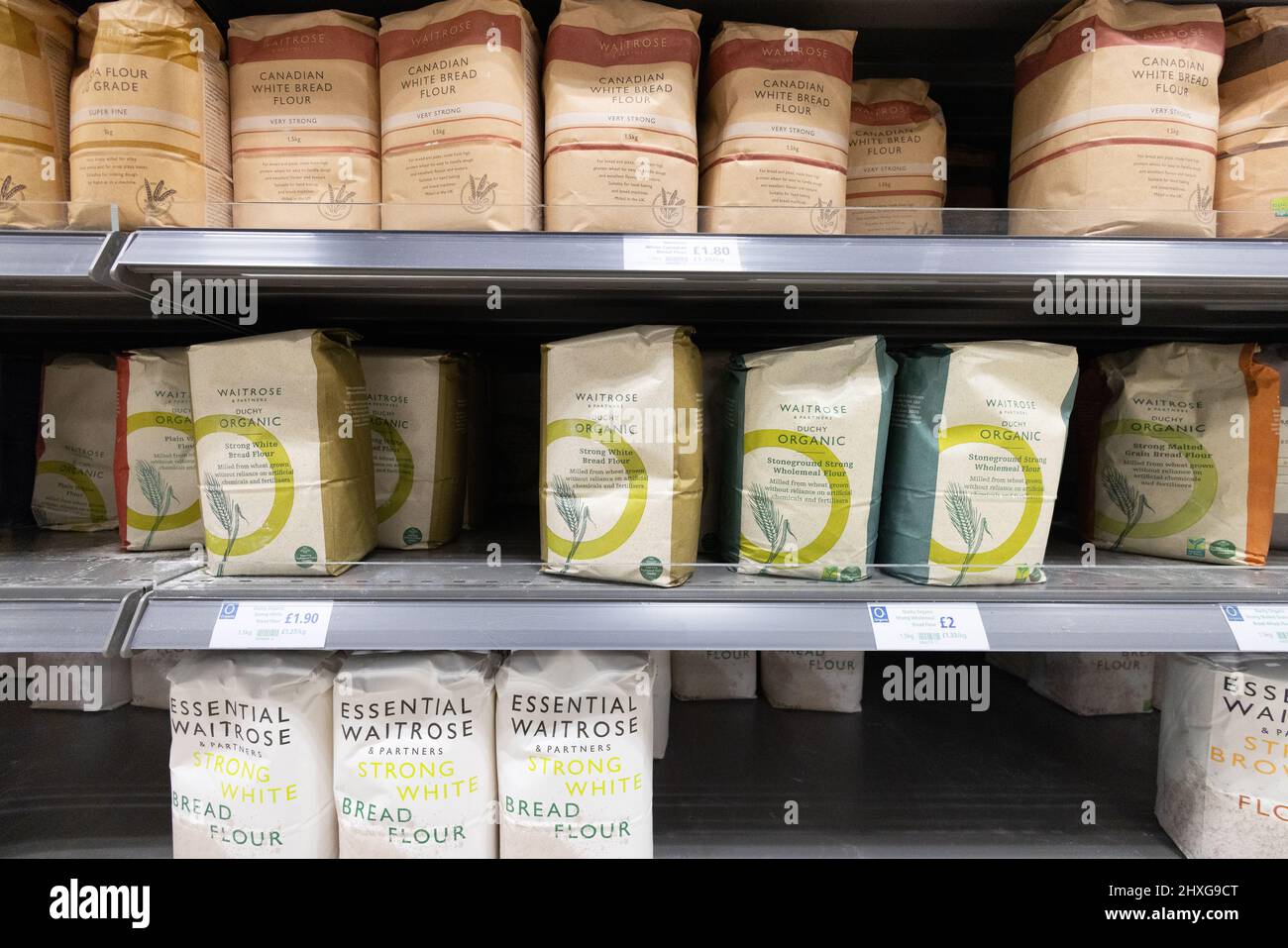 Supermarket flour UK; Bags of flour for sale on Waitrose supermarket shelves in the UK Stock Photo