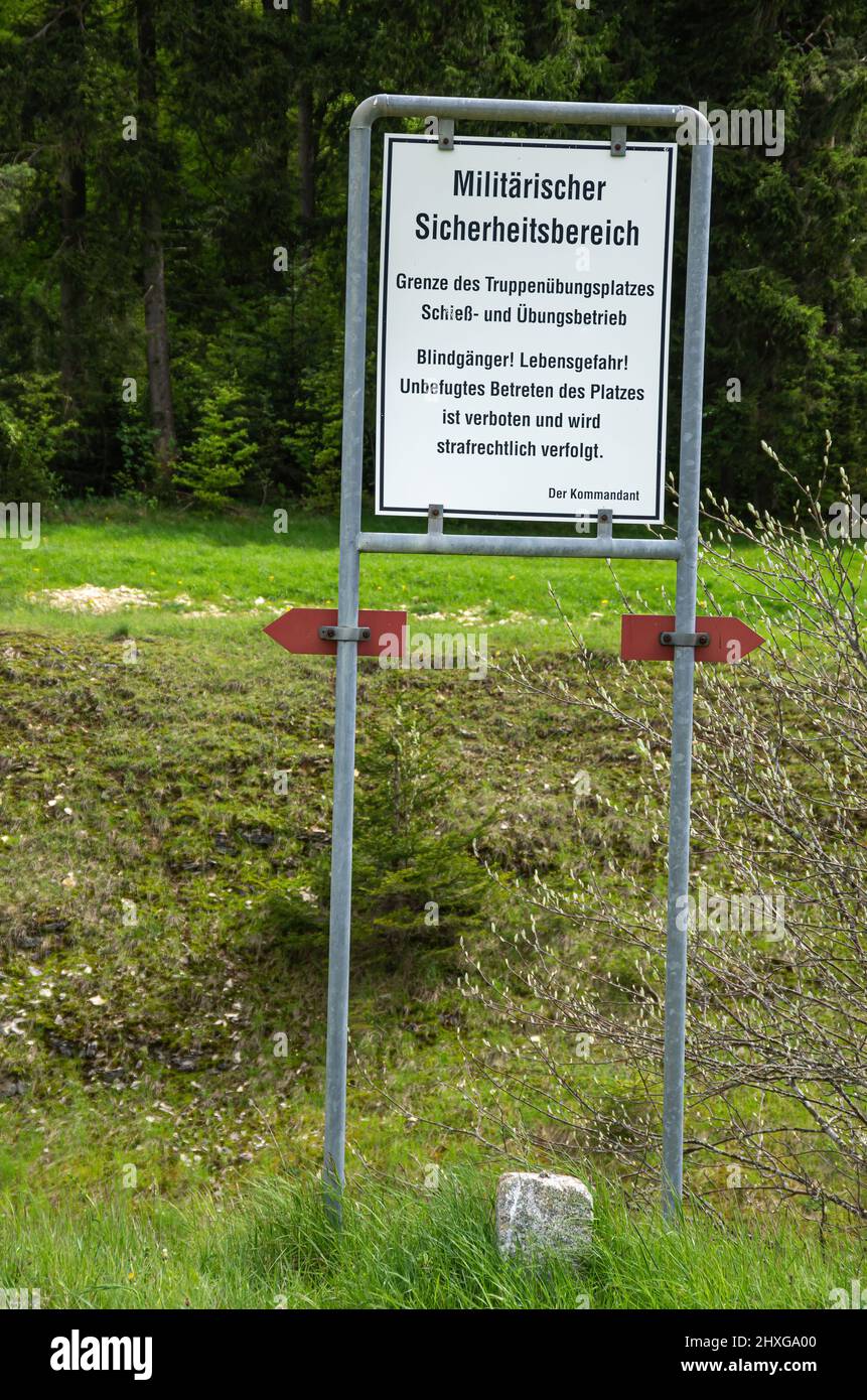 Warning and information sign of the commander about danger to life at the edge of the security zone at Heuberg military training area, Germany. Stock Photo
