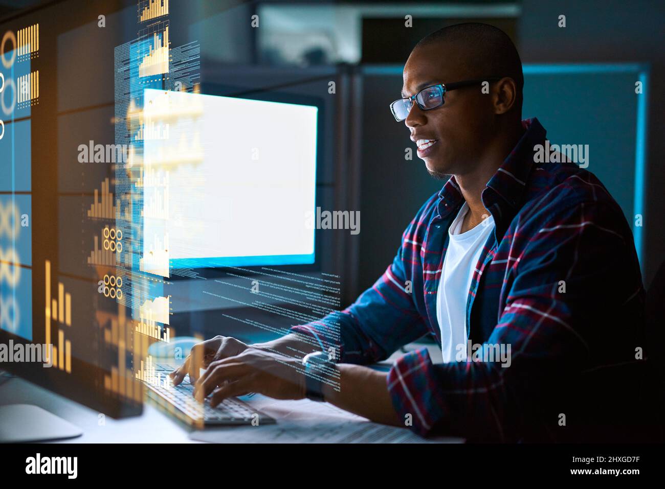Encoding in progress. Cropped shot of a young male programmer working on computer code in his office. Stock Photo
