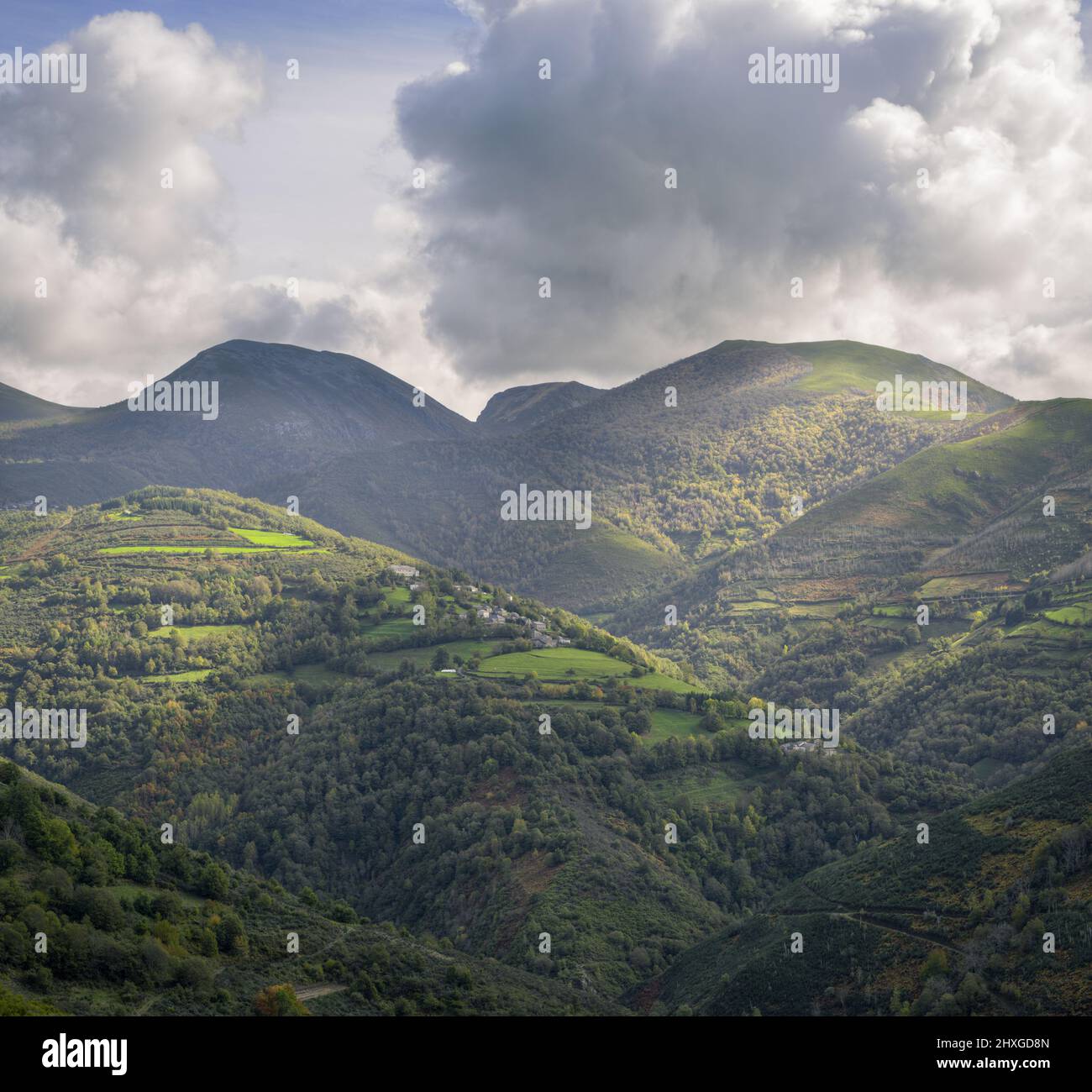 Small farming villages surrounded by pastures under the mountains in Cervantes Ancares Lugo Galicia Stock Photo
