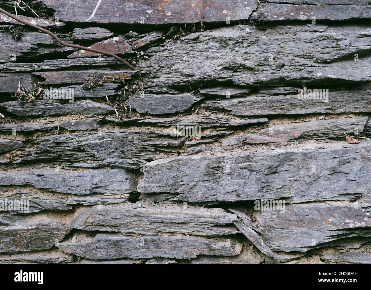 Stone and clay wall texture. Stone background with clay. Stock Photo