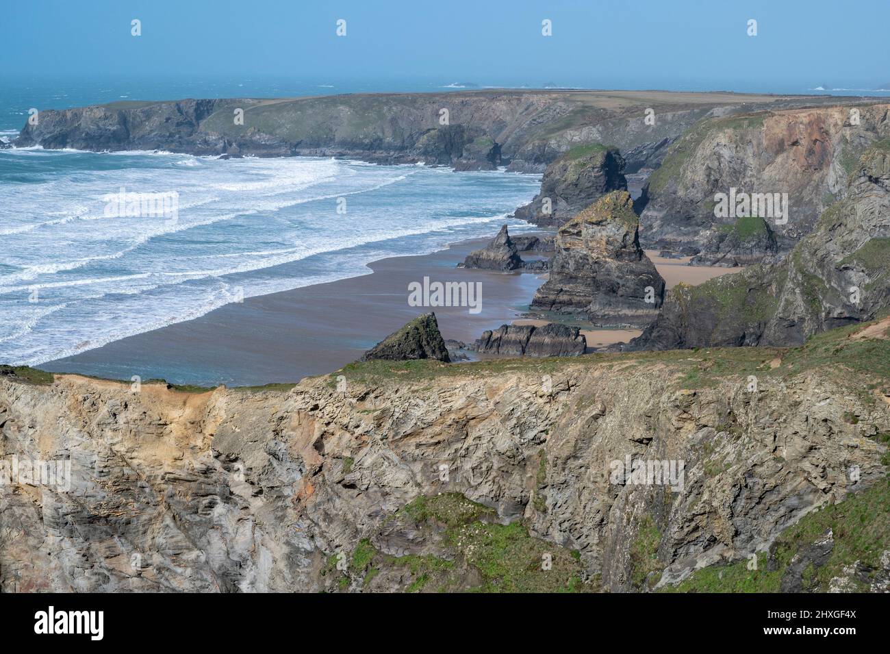Picturesque Bedruthan Steps, Carnewas, North Cornwal, UK, with rock stacks and pristine beach. Stock Photo