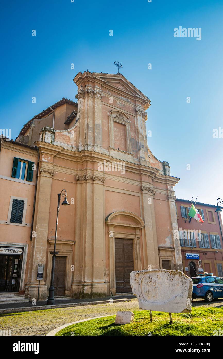 Feb. 6, 2022 - Tarquinia, Viterbo, Lazio, Italy - The Church of San Leonardo in the main square of the village. Italian flag. The police office. Stock Photo