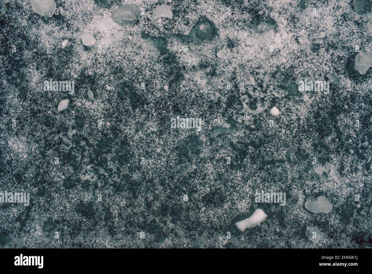 Frozen water background on snow Stock Photo