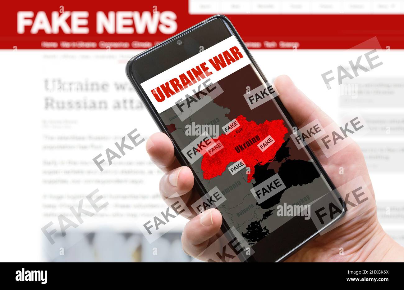 War in Ukraine and Fake News theme, Russia and Ukraine conflict on mobile phone screen. Russia vs Ukraine in media. Concept of politics, communication Stock Photo