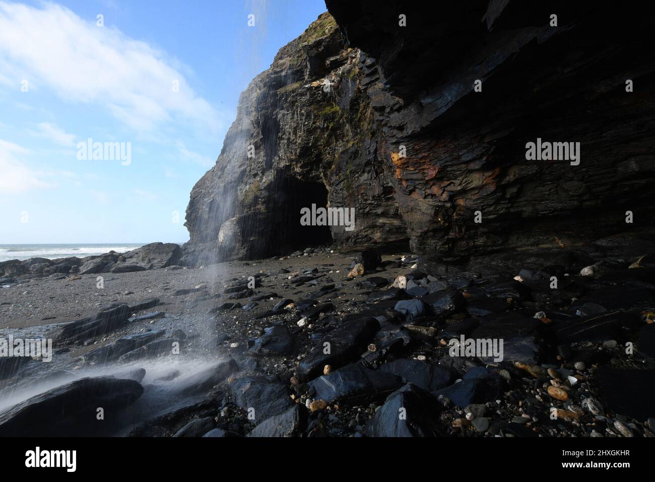 The waterfall at Tregardock Beach Cornwall Stock Photo