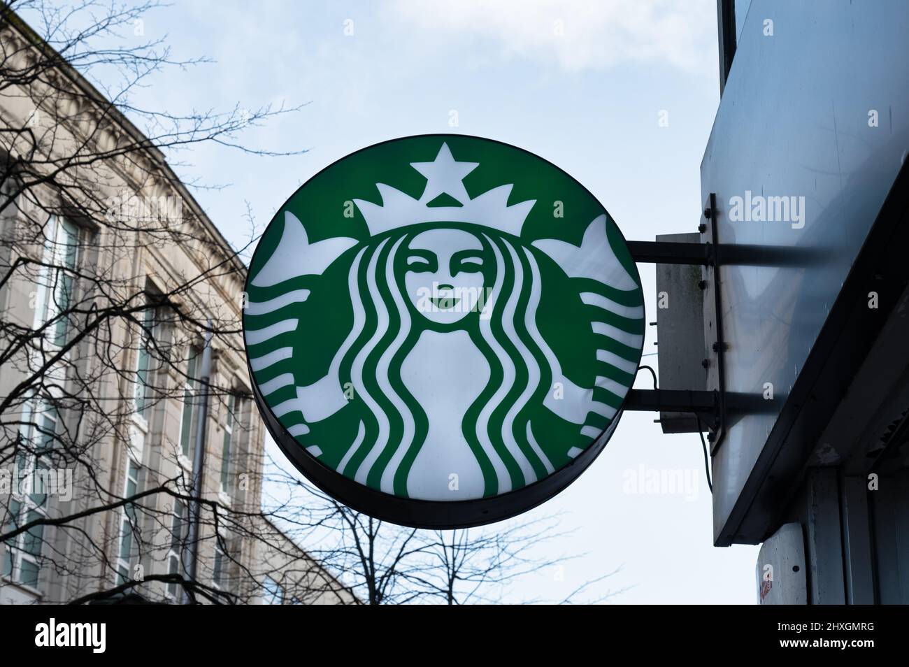 Belfast, UK- Feb 19, 2022: The Starbucks sign in Belfast Northern Ireland. Stock Photo