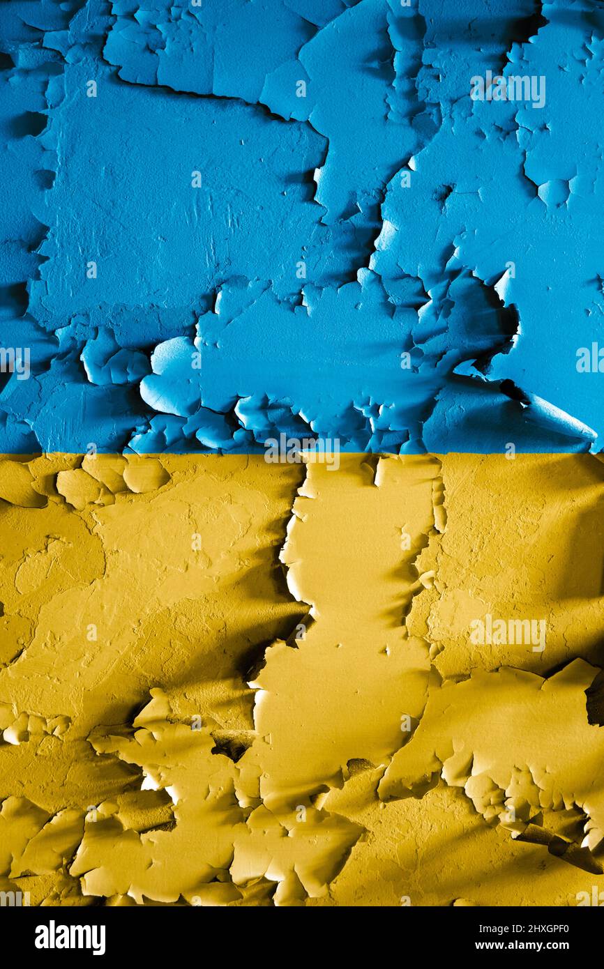 Flag of Ukraine on a cracked grunge background. Square background. Stock Photo