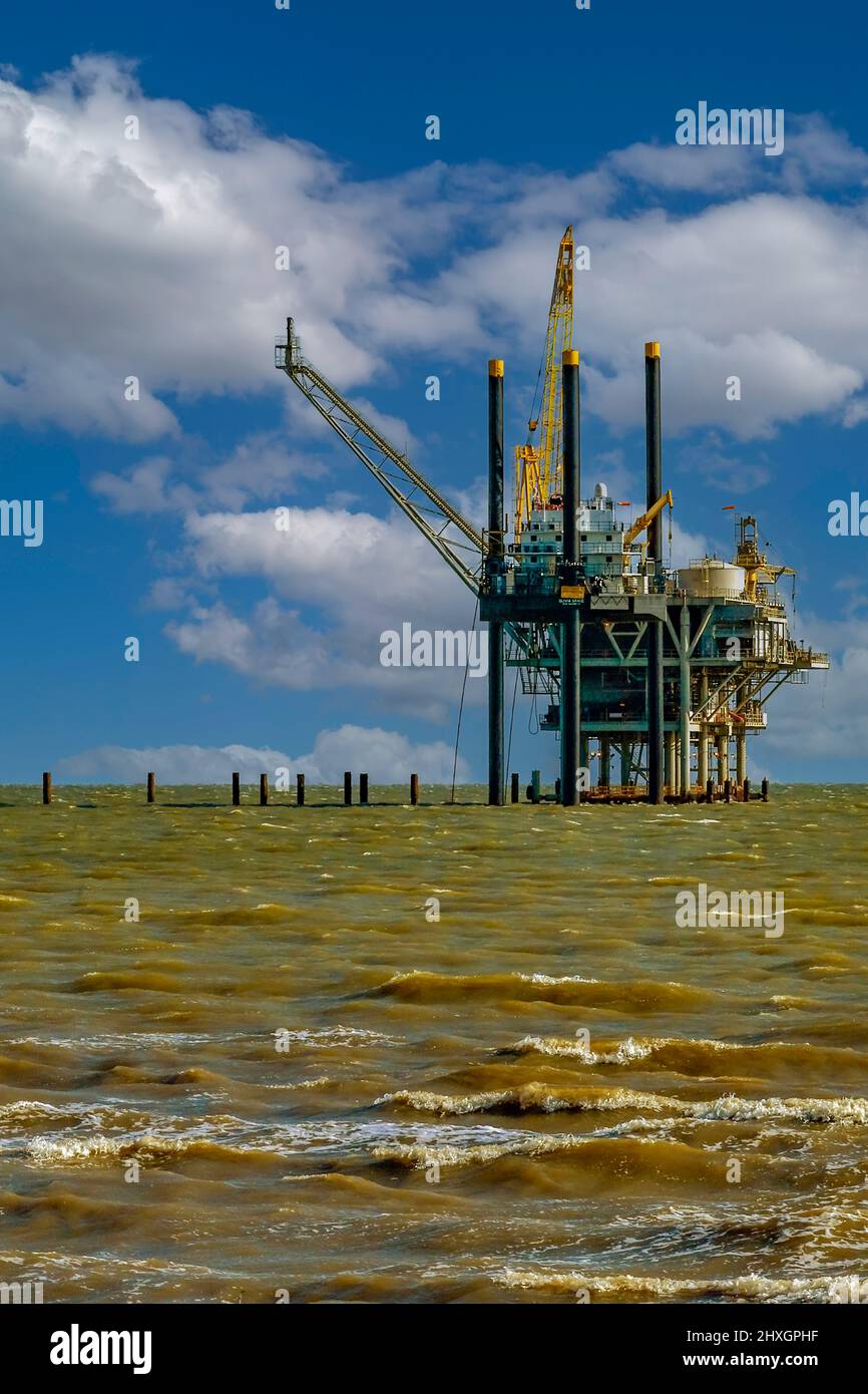 Oil Rig in Mobile Bay Alabama off Gulf Shore, Gulf Islands, Gulf of Mexico. Stock Photo