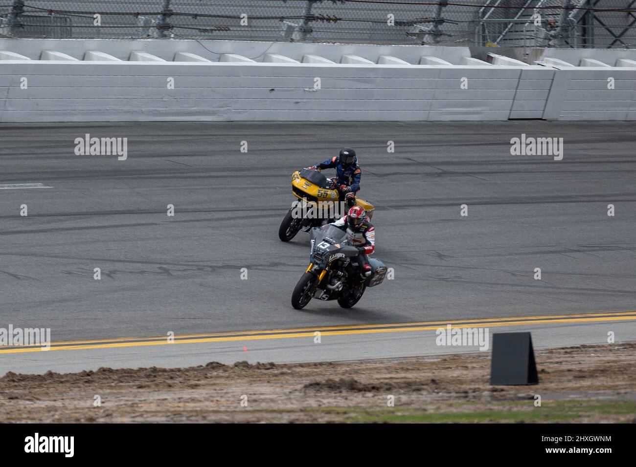 Daytona Beach, FL, USA. 12th March 2022. 13 Cory West, 55 Eric Stahl goes through the track during the Mission King of the Baggers at Daytona International Speedway in Daytona Beach, FL. 2022, MotoAmerica, home of AMA Superbike and North America's premier motorcycle road racing series. Credit: Yaroslav Sabitov/Yes Market Media/Alamy Live News Stock Photo