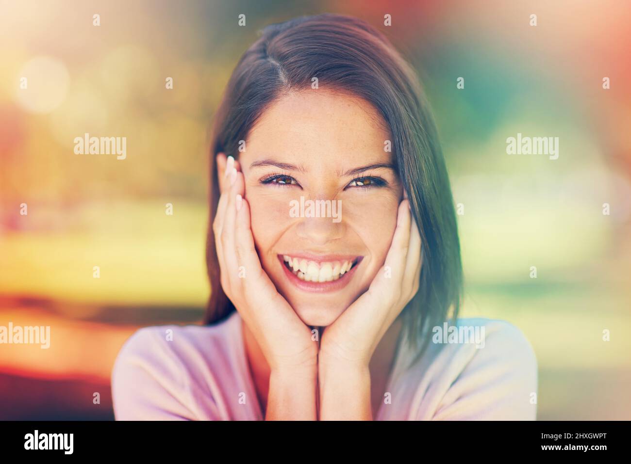 Sunny days and smiles. Portrait of a beautiful young woman enjoying a ...