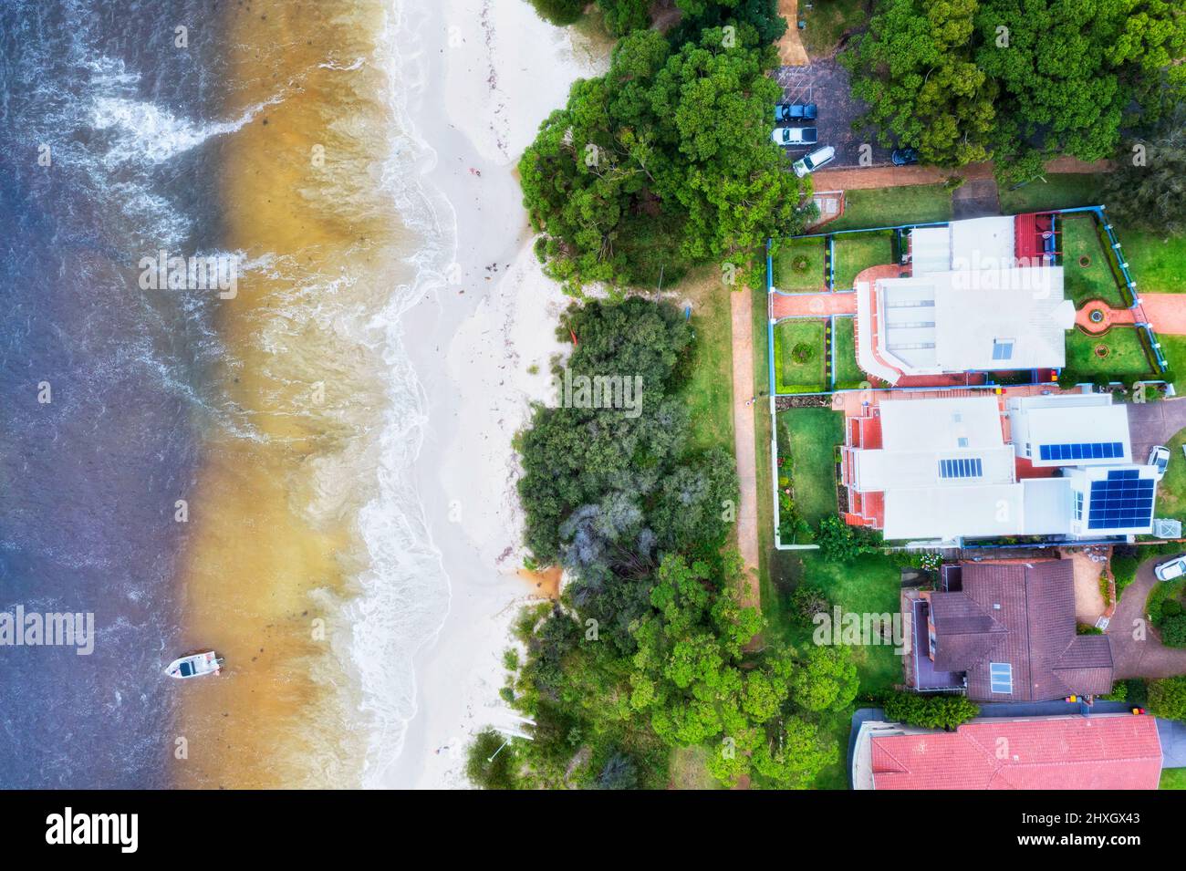 Waterfront of Collingwood beach in Vincential town at Jervis bay - aerial top down view. Stock Photo