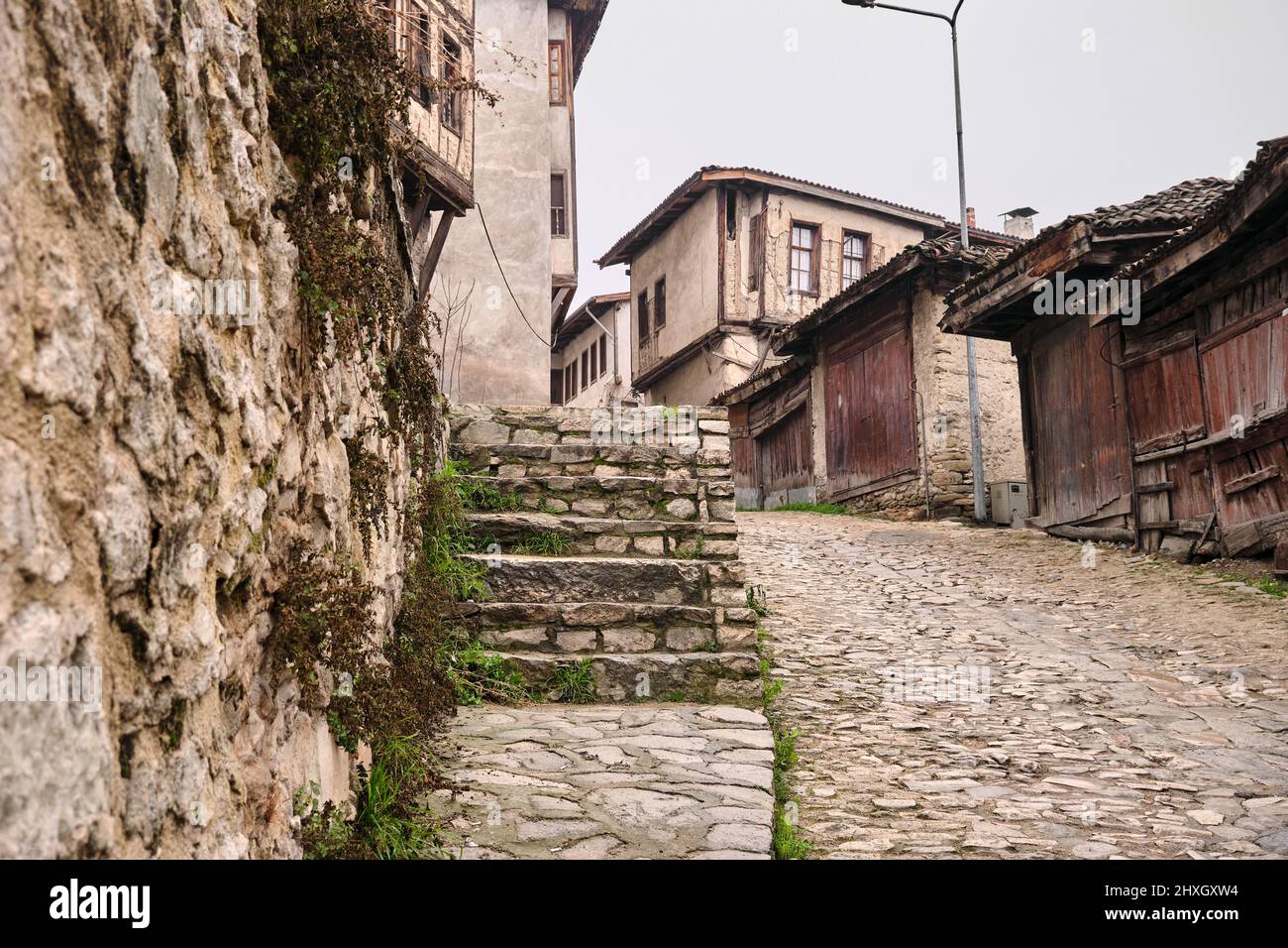 Safranbolu houses at winter, cobblestone way and ancient ottoman style houses at Safranbolu Stock Photo