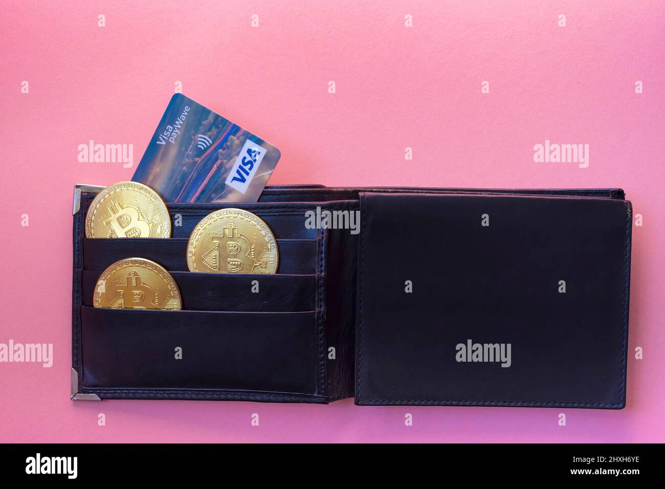 Graz, Austria-May 11, 2021: Black leather wallet with Euro currency, Visa  credit card and Bitcoin BTC crypto gold coins, new virtual money concept  Stock Photo - Alamy