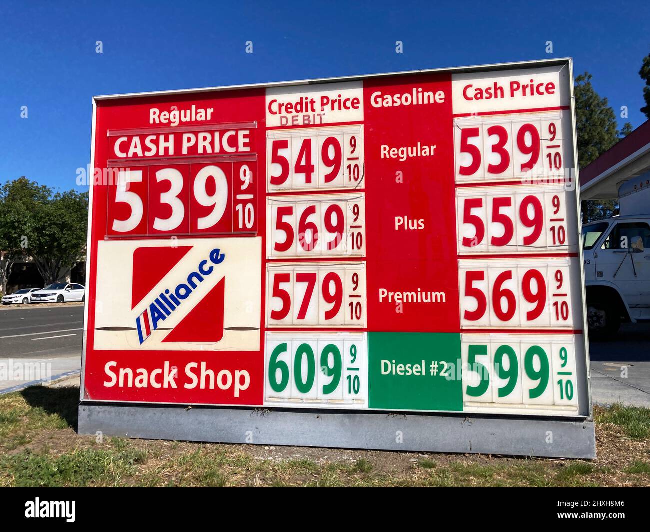 Gas station price sign. The average gasoline price in California exceeded 5 dollars per gallon - San Jose, California, USA - March 11, 2022 Stock Photo