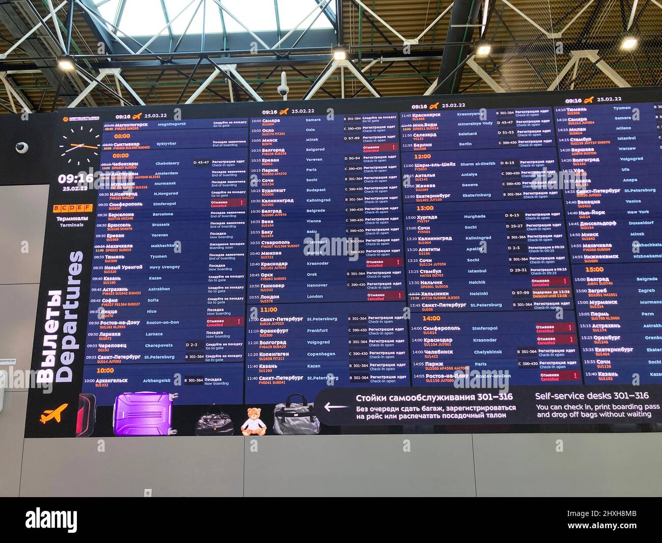 Departure board in Sheremetyevo International Airport with canceled domestic flights to cities in southern Russia. - Moscow, Russia - February 25, 202 Stock Photo