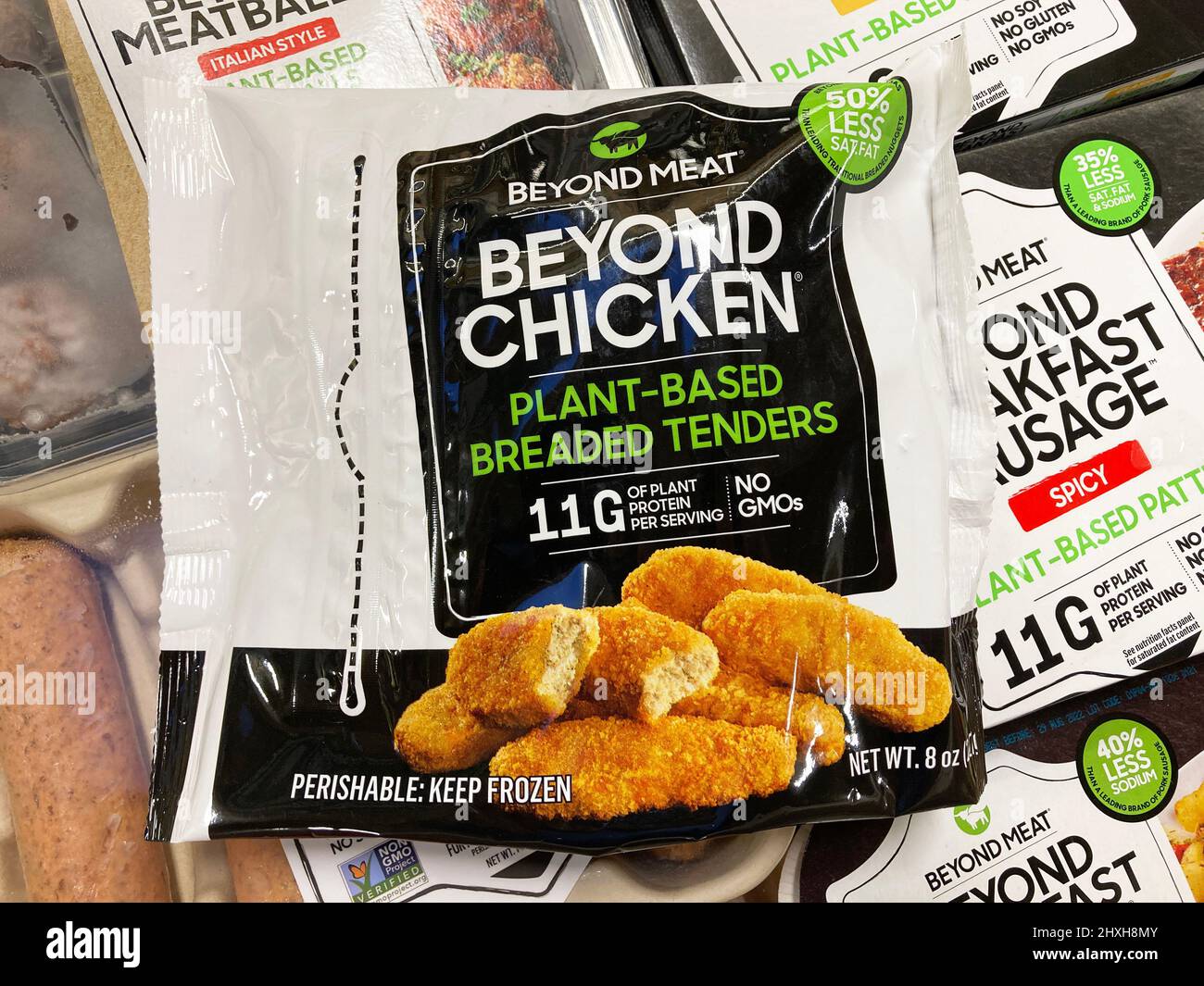 Beyond Chicken plant based breaded tenders by Beyond Meat available for vegan customers on shelves of alternative meat section of grocery store. - San Stock Photo