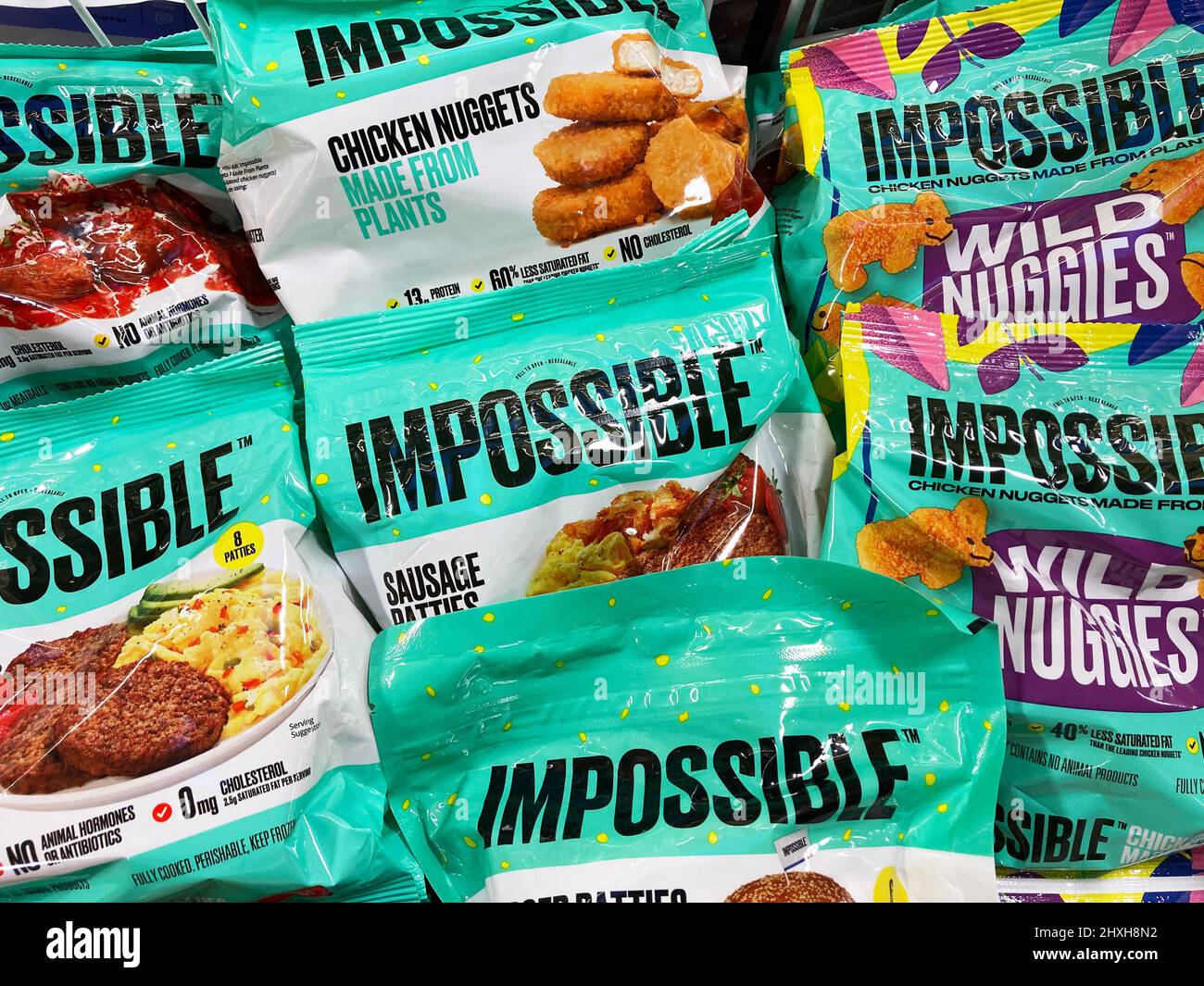 Impossible Foods chicken nuggets available for vegan customers on shelves of alternative meat section of grocery store. - San Jose, California, USA - Stock Photo