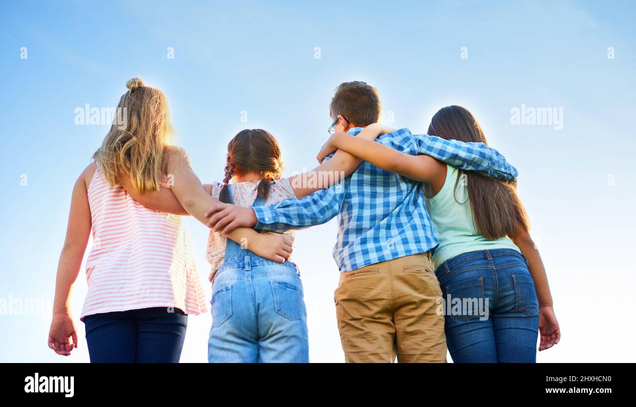 Dont be mean be meaningful. Shot of a group of elementary school children together. Stock Photo