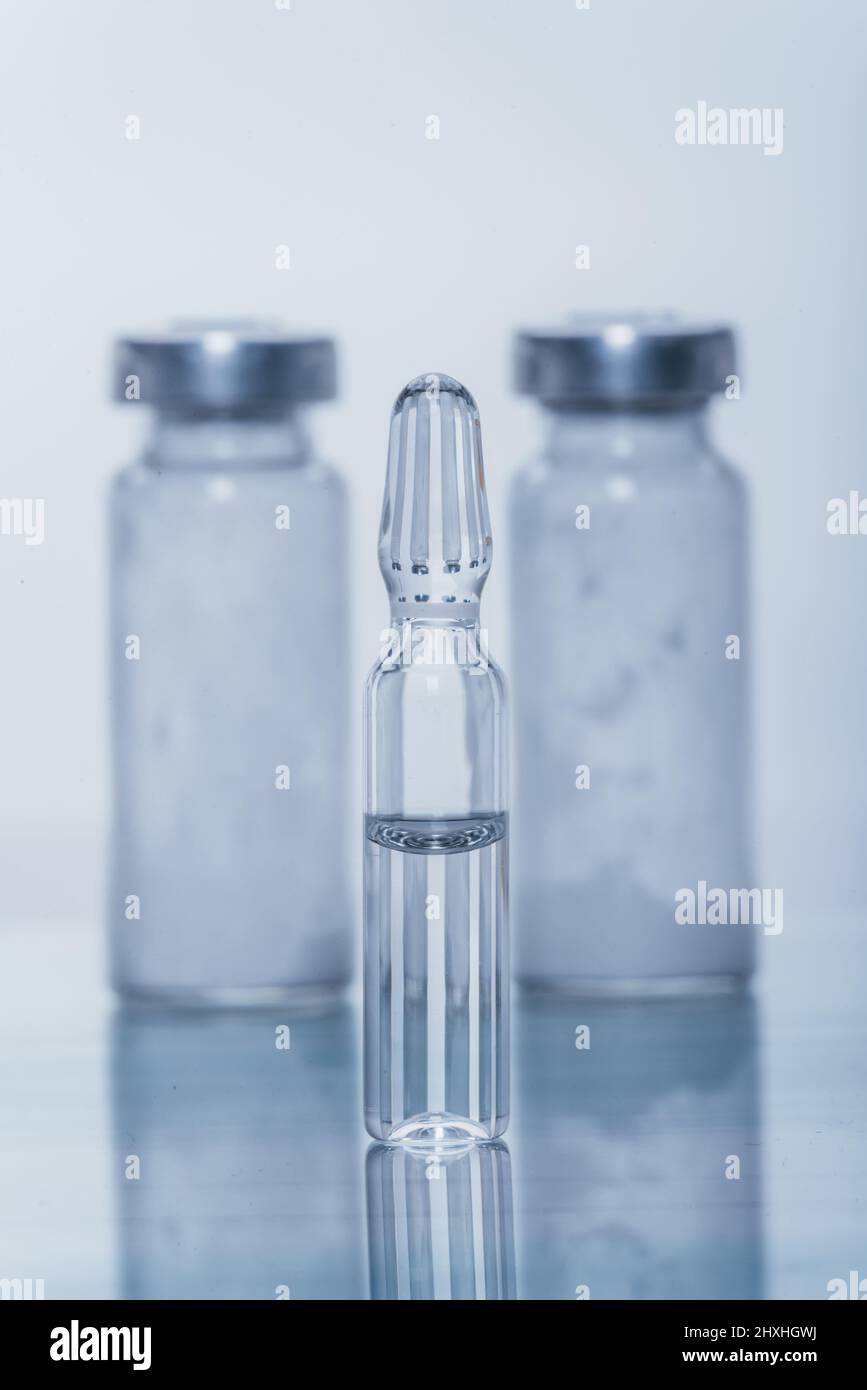Glass medical ampoule vial for injection. Medicine is liquid sodium ...