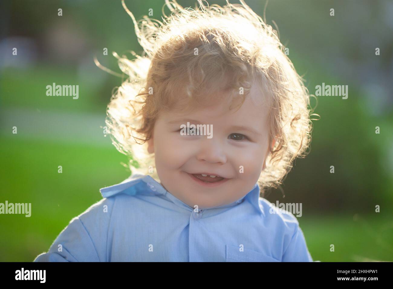 Baby child enjoy the summer on the nature in the park outdoor. Baby