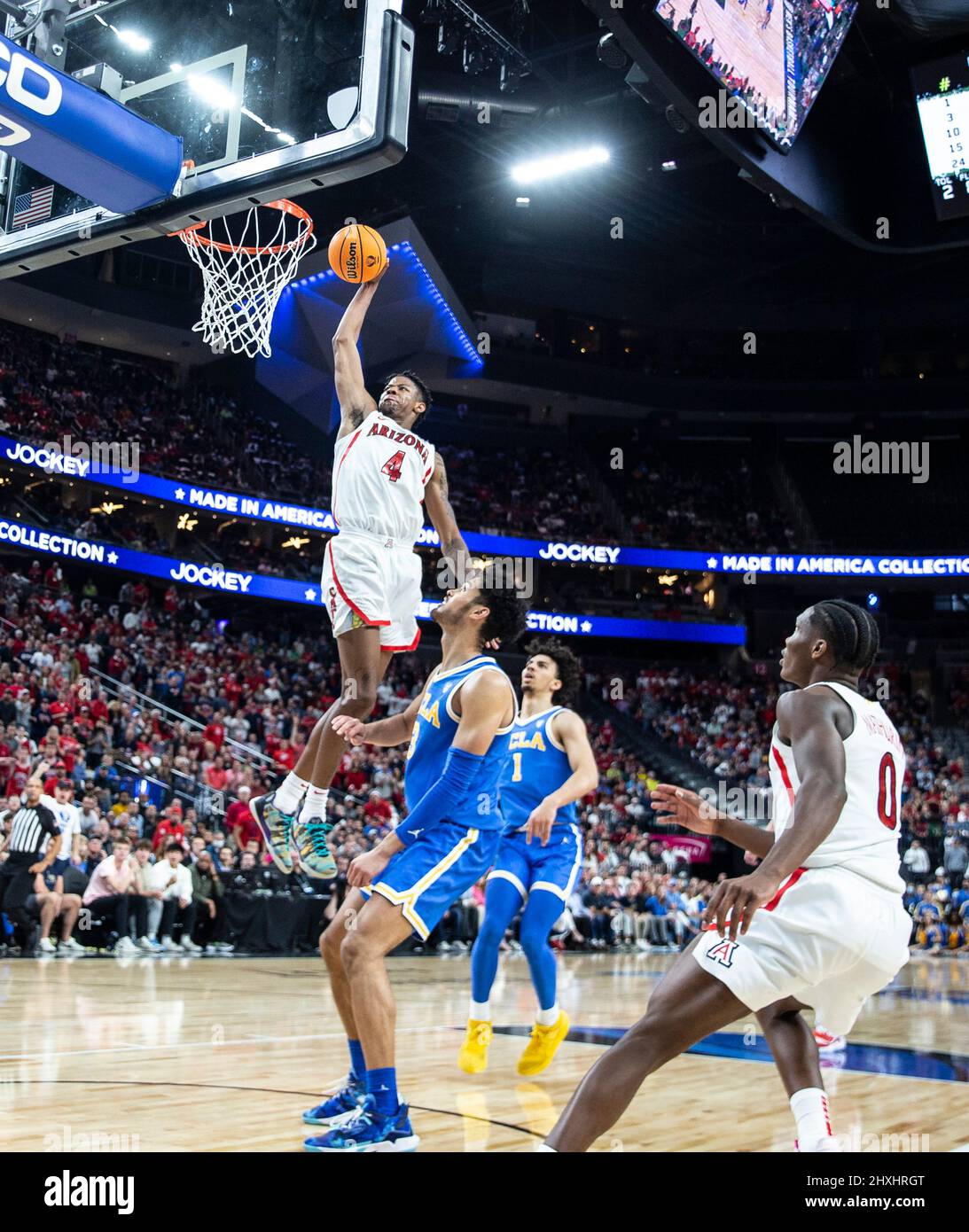 Las Vegas, NV, USA. 12th Mar, 2022. A. Arizona guard Dalen Terry (4) slam  dunks the ball during the NCAA Pac 12 Men's Basketball Tournament  Championship game between UCLA Bruins and the