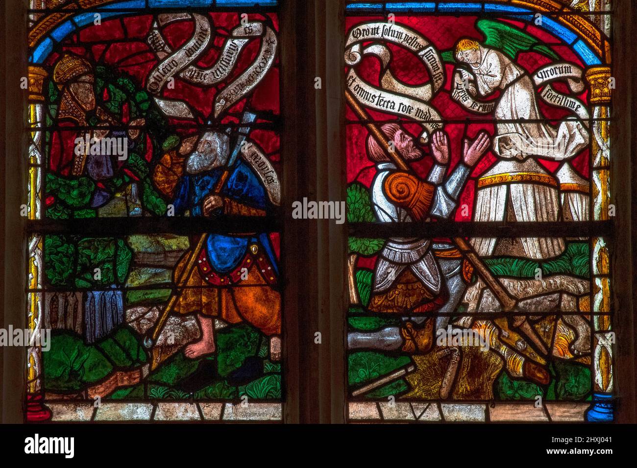 Moses and the Burning Bush and Gideon and the Fleece: two Hebrew Bible and Old Testament stories illustrated in glowing Troyenne stained glass in a Tree of Jesse window of 1512 in the village church at Ceffonds, in the Champagne region of northwest France. Stock Photo