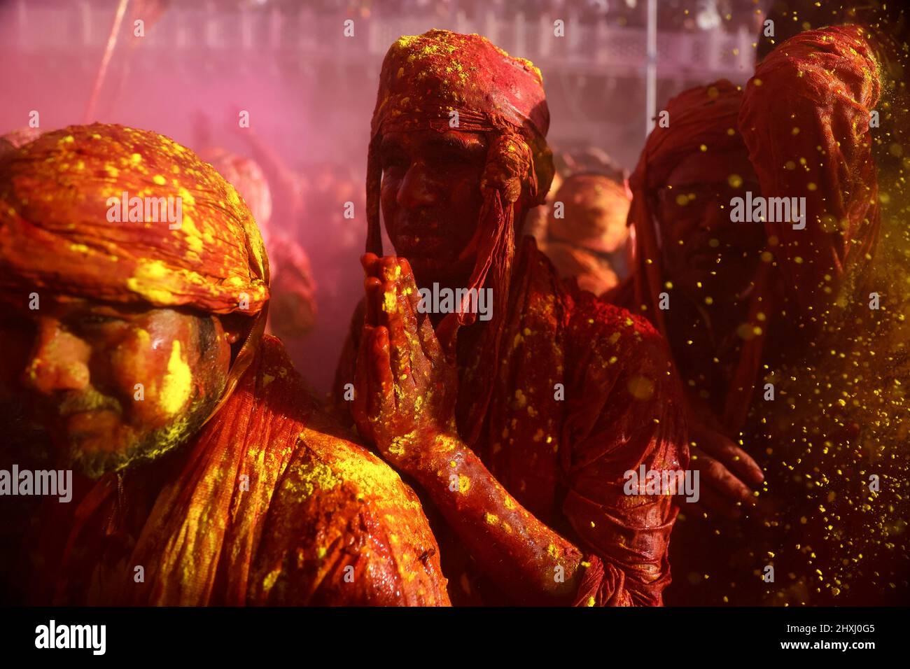 Uttar Pradesh, New Delhi, India. 12th Mar, 2022. Hindu devotees daubed in colors take part in the religious festival of ''Lathmar Holi'', in the town of Nandgaon. (Credit Image: © Karma Sonam Bhutia/ZUMA Press Wire) Stock Photo