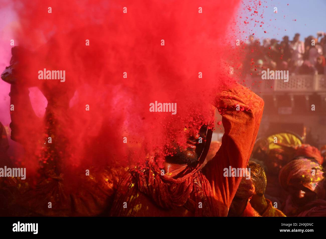 Uttar Pradesh, New Delhi, India. 12th Mar, 2022. Hindu devotees daubed in colors take part in the religious festival of ''Lathmar Holi'', in the town of Nandgaon. (Credit Image: © Karma Sonam Bhutia/ZUMA Press Wire) Stock Photo