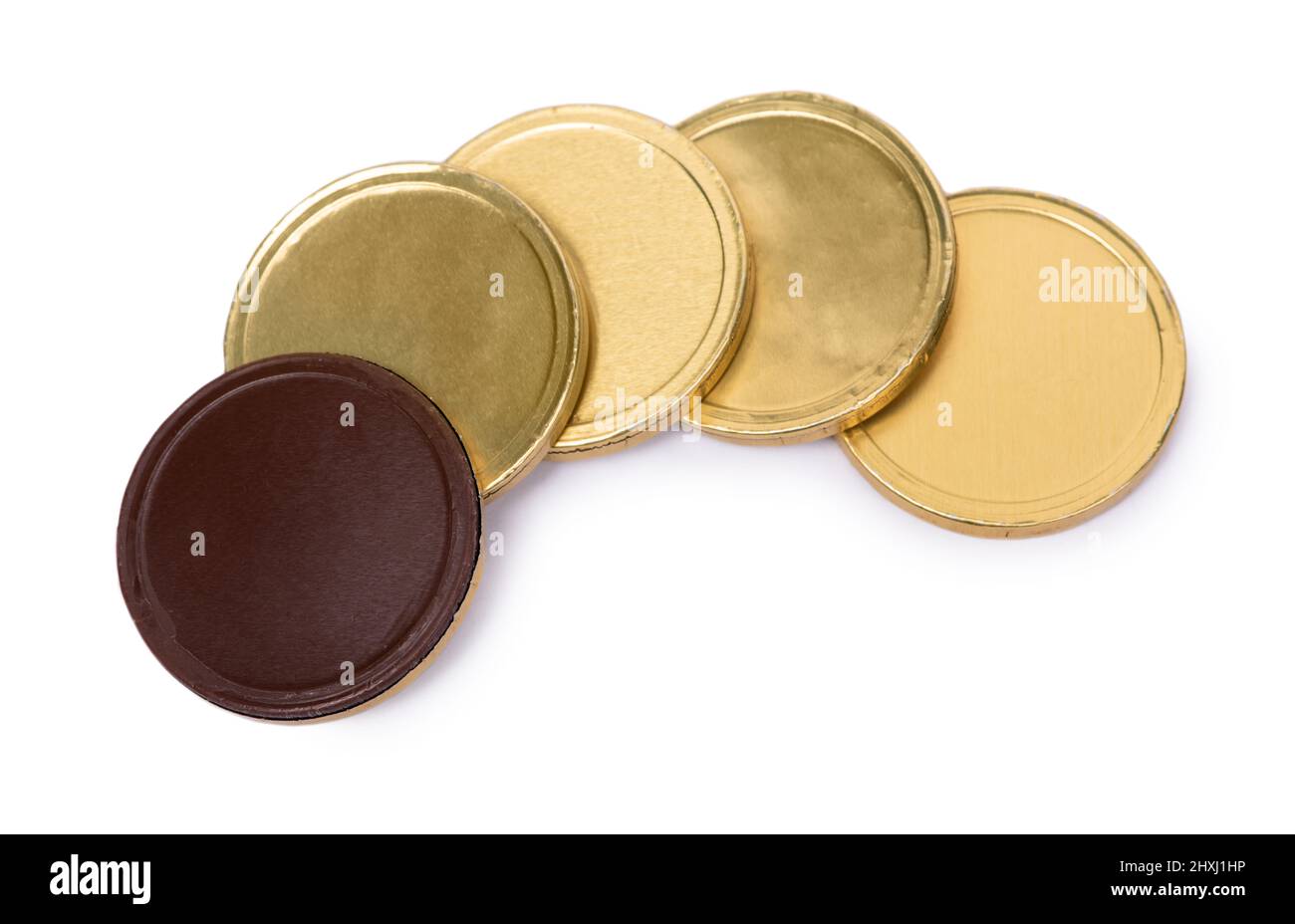 Chocolate candies in the form of coins in golden foil isolated over white background Stock Photo