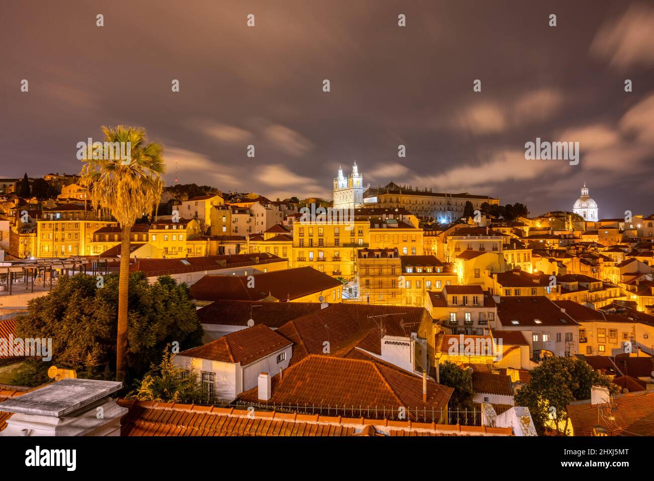 View of the old Alfama district in Lisbon, Portugal, at night Stock Photo