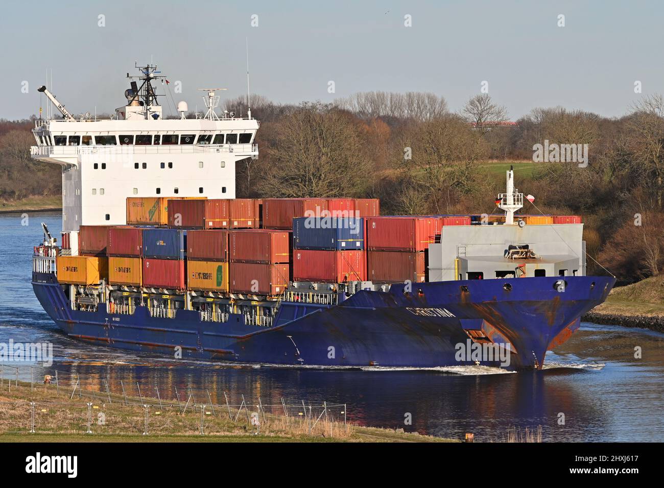 Containership CHRISTINA passing the Kiel Canal Stock Photo