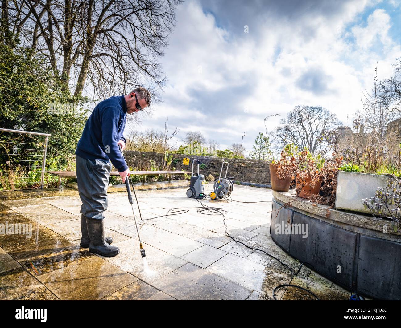 A groundsman working at Corpus Christi College, Oxford, Known as CCC a constituent colleges of Oxford Univerity. Stock Photo