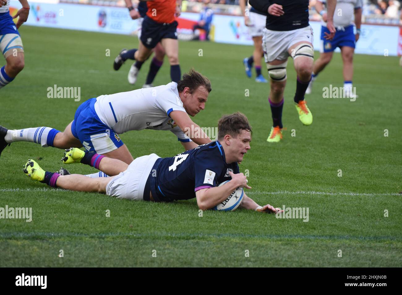 March 12, 2022, Rome, Lazio, Italy: Rome, Italy March 2022: Guinness Six Nations of rugby, the Scottish wing Darcy Graham realizes a try, italian team wear  white shirt and with blue shirt Scotland. Scotland won 22-33  (Credit Image: © Pasquale Gargano/Pacific Press via ZUMA Press Wire) Stock Photo