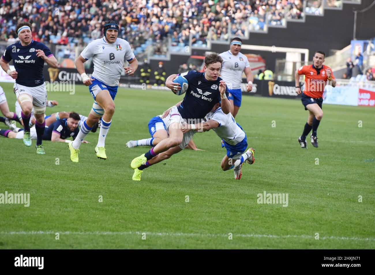 March 12, 2022, Rome, Lazio, Italy: Rome, Italy March 2022: Guinness Six Nations of rugby, the Scottish wing Darcy Graham realizes a try, italian team wear  white shirt and with blue shirt Scotland. Scotland won 22-33  (Credit Image: © Pasquale Gargano/Pacific Press via ZUMA Press Wire) Stock Photo