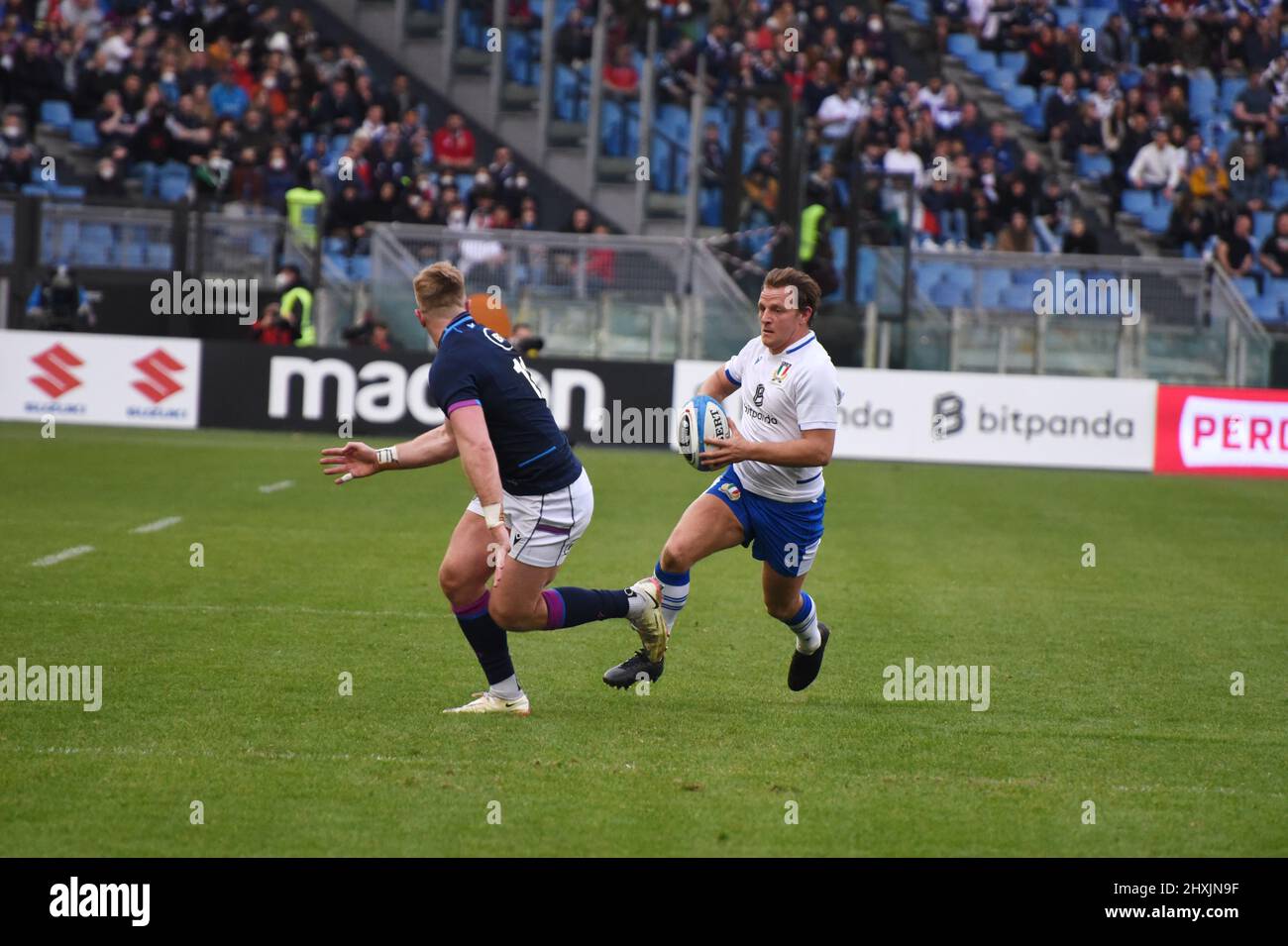 March 12, 2022, Rome, Lazio, Italy: Rome, Italy March 2022: Guinness Six Nations of rugby, the italian scrum half Callum Braley run with ball, italian team wear  white shirt and with blue shirt Scotland. Scotland won 22-33  (Credit Image: © Pasquale Gargano/Pacific Press via ZUMA Press Wire) Stock Photo