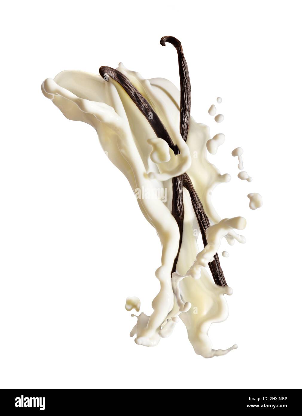 A flying gush of milk meets two vanilla shooters in the air in an epic moment against a white background. Stock Photo