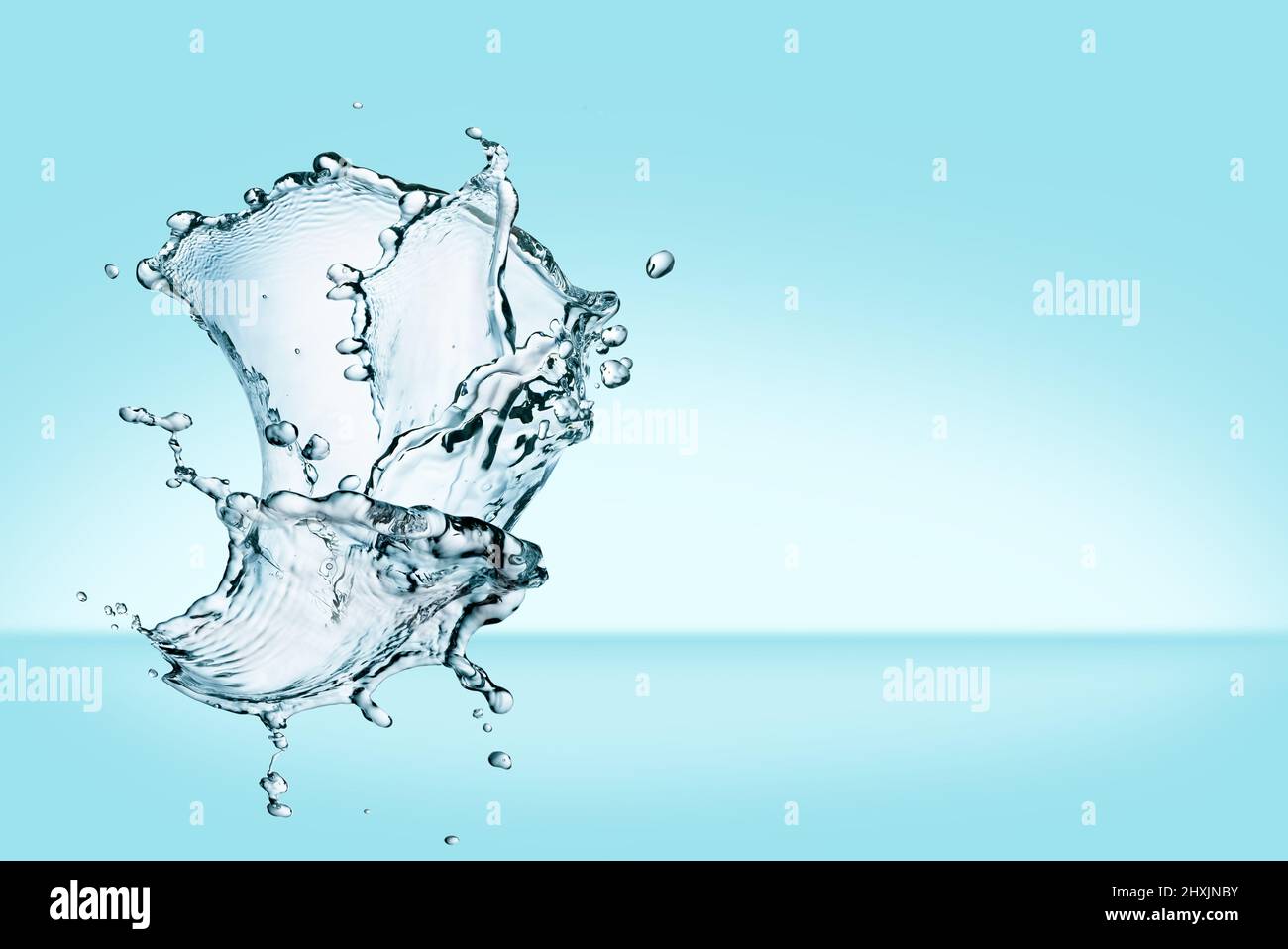 Clear water flies through the air, forming an amorphous water sculpture ...